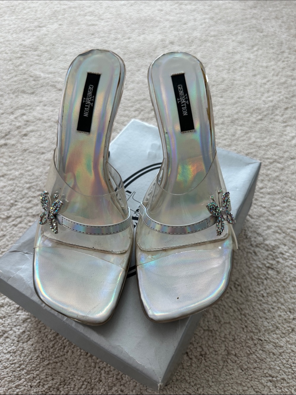 GENERATION Y Iridescent Clear Slide Mules with Crystal Bow Accent